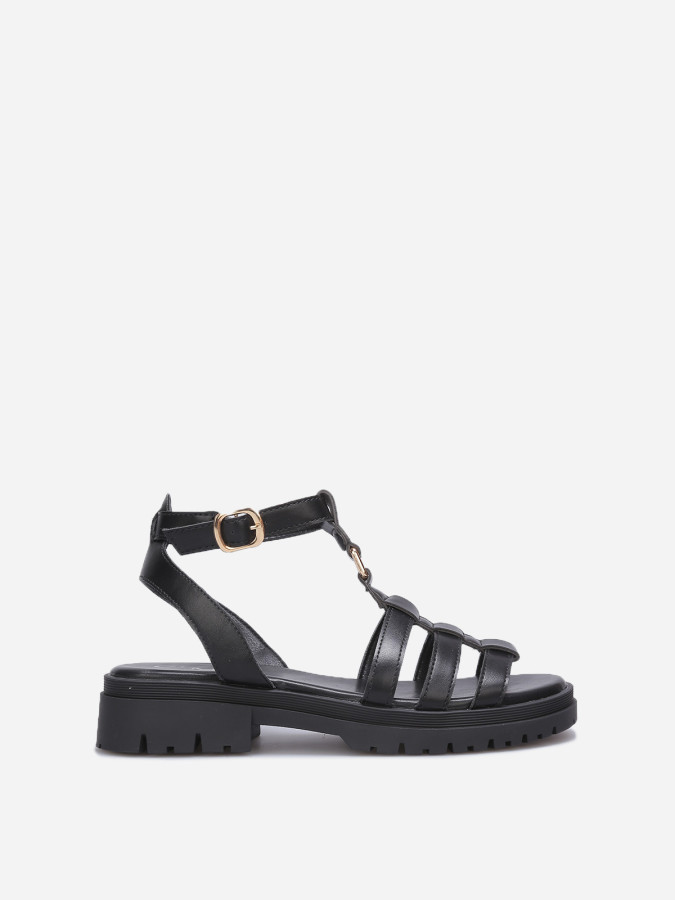 Sandales plates à boucles dorées noires