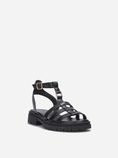 Sandales plates à boucles dorées noires