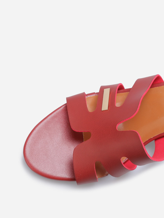 Mules à bride ajourée et talon rouges