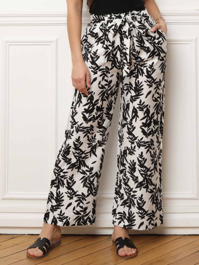 Pantalon ceinturé noir à motifs feuilles