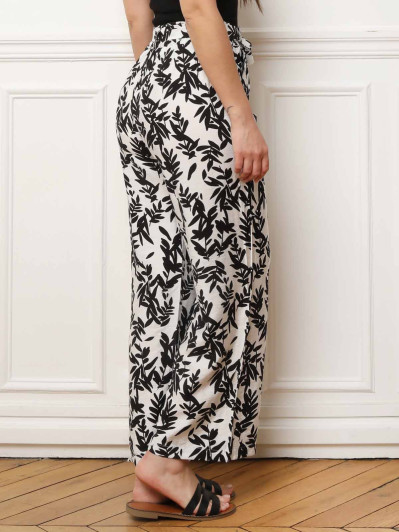 Pantalon ceinturé noir à motifs feuilles