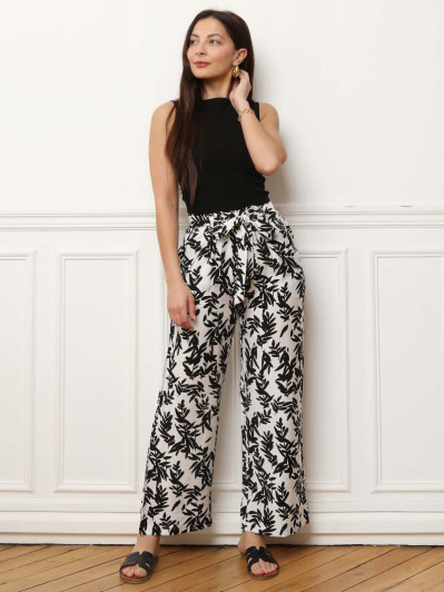 Pantalon ceinturé noir à motifs feuilles