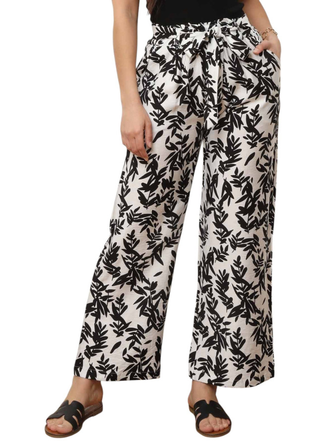 Pantalon ceinturé noir à motifs feuilles