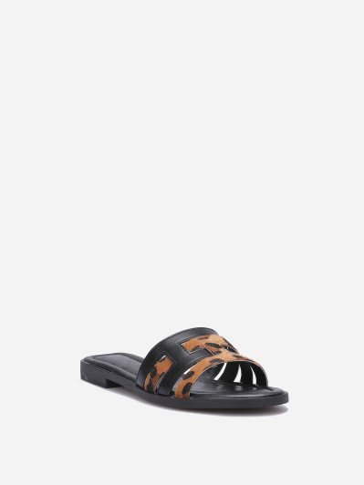 Mules noires à brides imbriquées et léopard