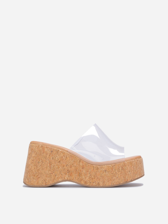 Mules compensées à bride large transparentes