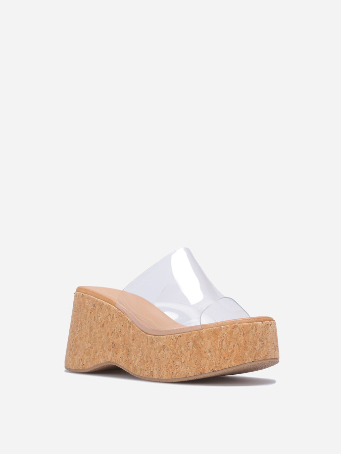 Mules compensées à bride large transparentes