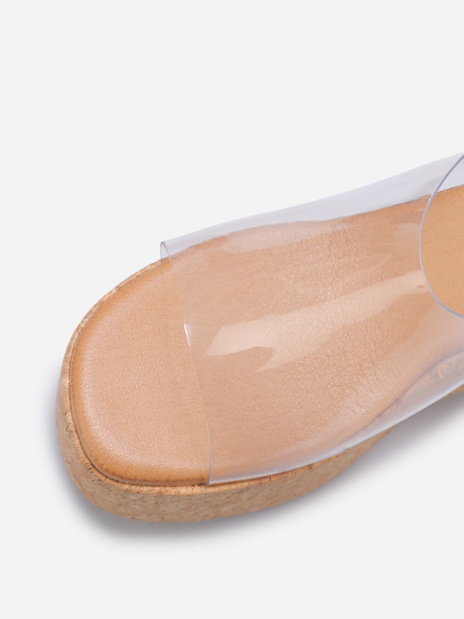 Mules compensées à bride large transparentes