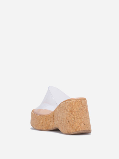 Mules compensées à bride large transparentes