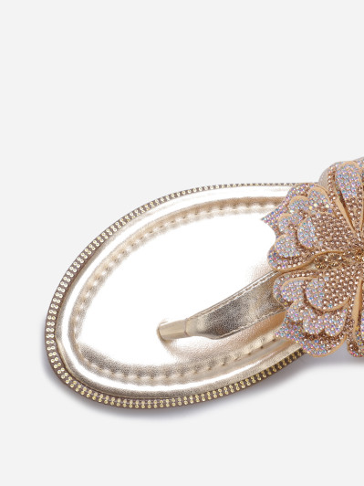 Sandales dorées avec détail papillon à strass