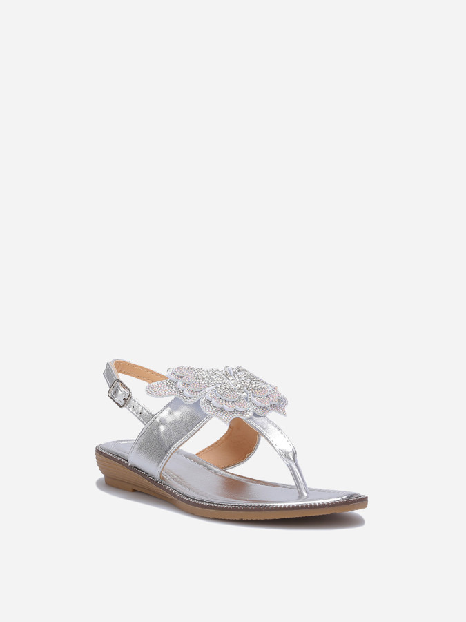 Sandales argentées avec détail papillon à strass