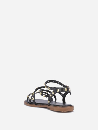 Sandales noires plates à clous dorés