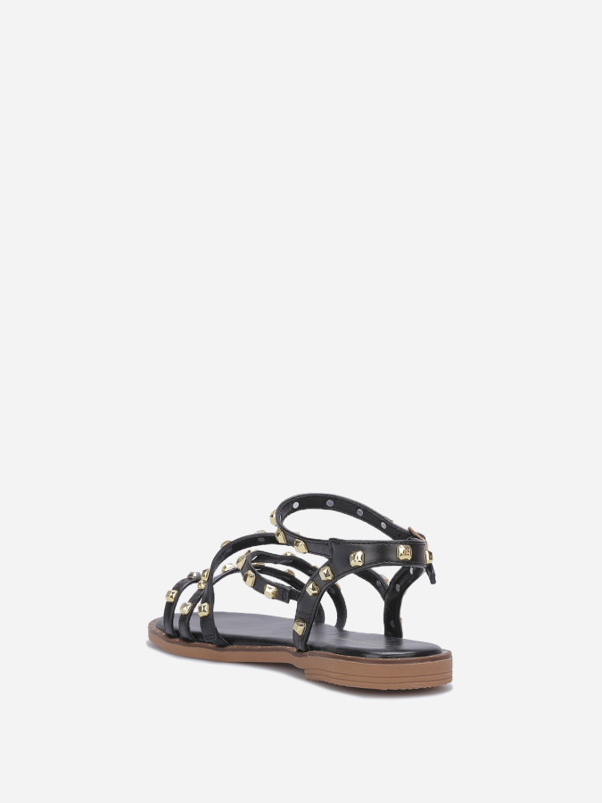 Sandales noires plates à clous dorés