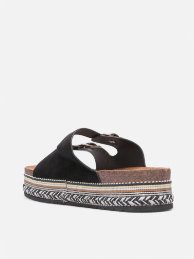 Mules en suédine à plateforme tressée noires