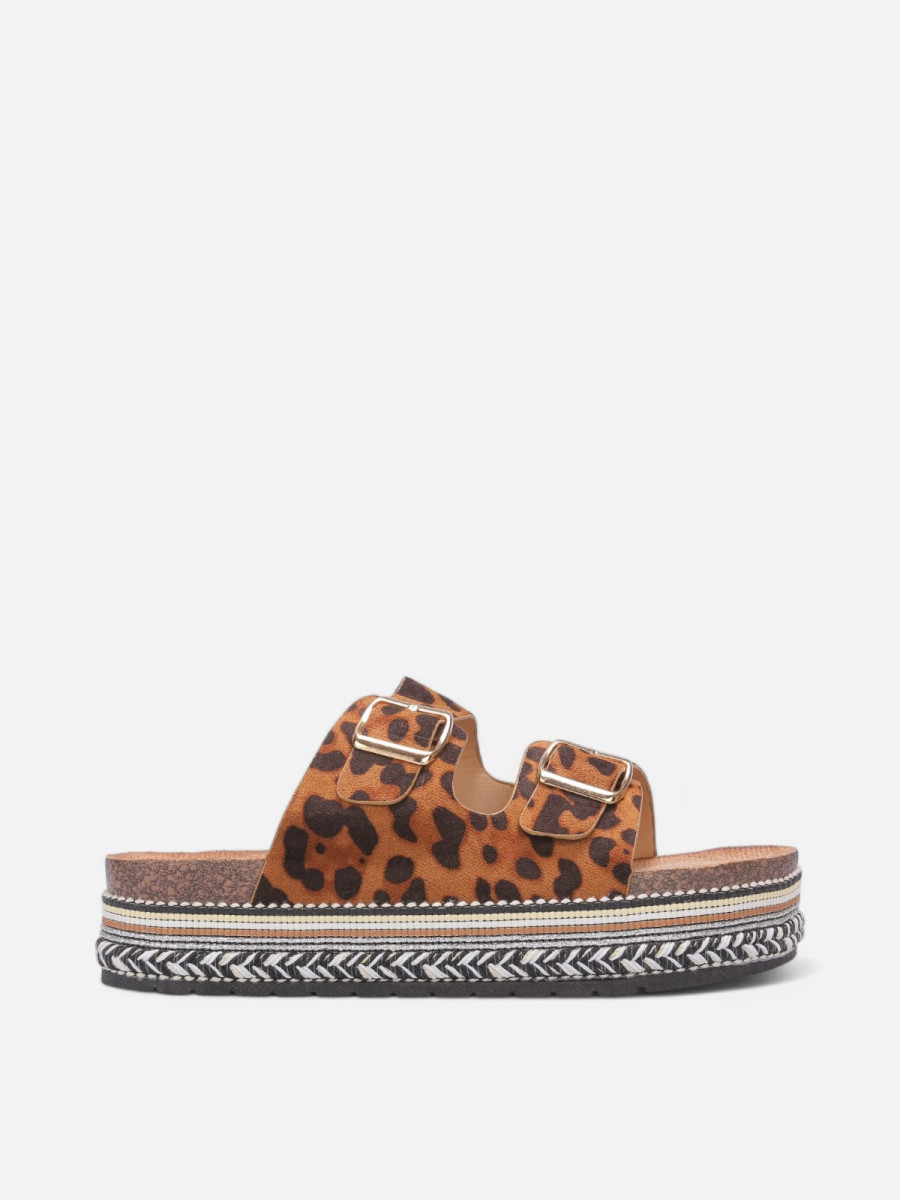 Mules en suédine à plateforme tressée léopard