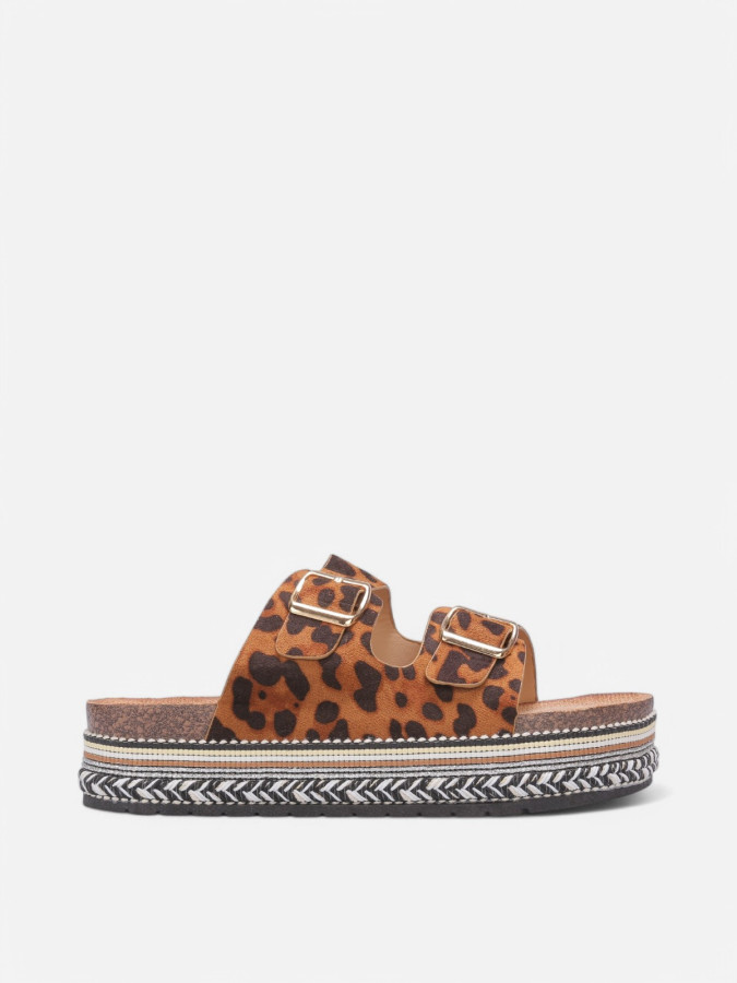 Mules en suédine à plateforme tressée léopard