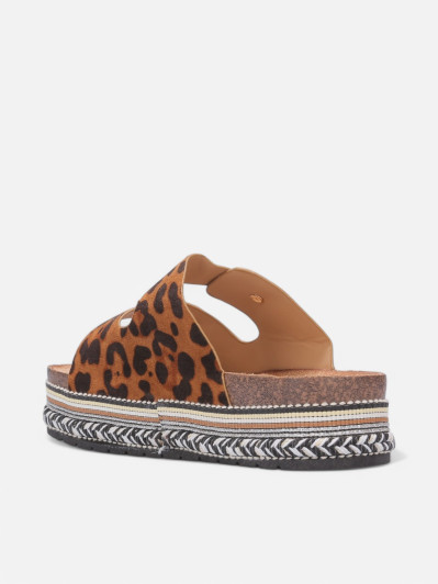 Mules en suédine à plateforme tressée léopard