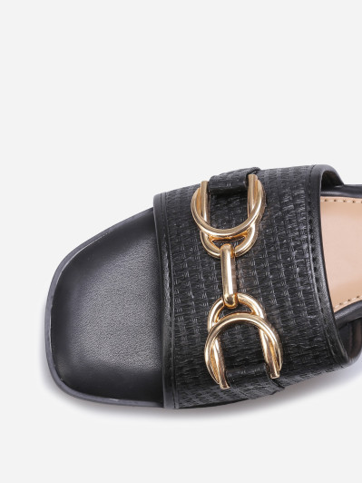 Mules noires à bride style raphia et mors doré