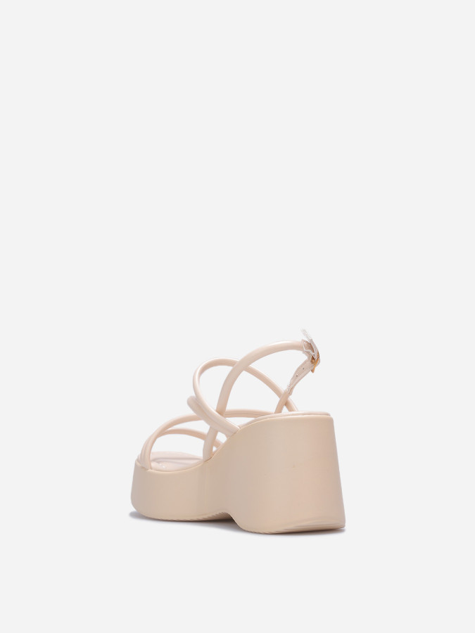 Sandales beiges à plateforme et lanières croisées