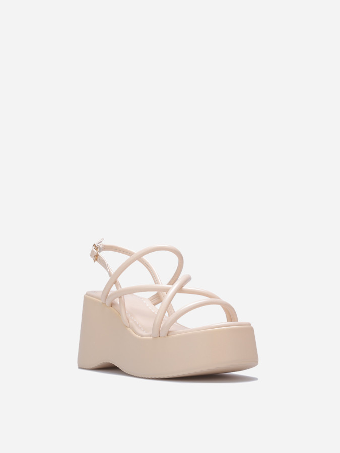 Sandales beiges à plateforme et lanières croisées