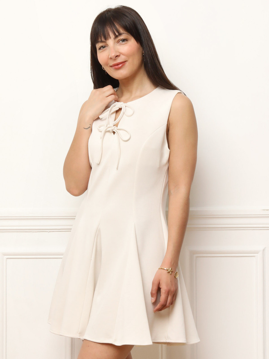 Robe patineuse à nœuds beige