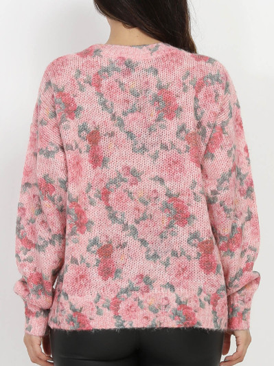 Pull en crochet rose à motifs fleurs