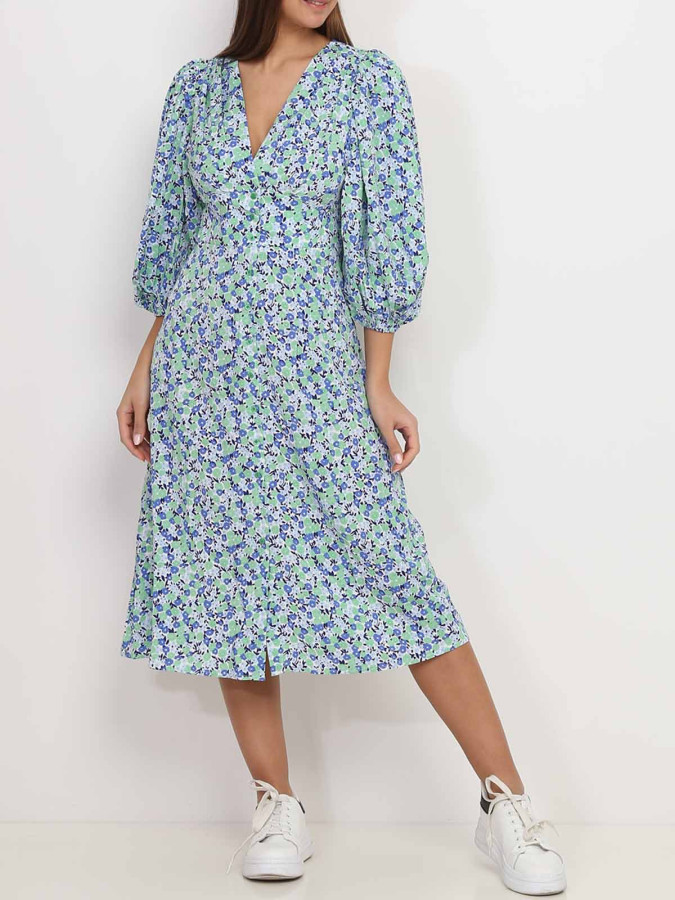 Robe mi-longue verte fleurie à manches bouffantes
