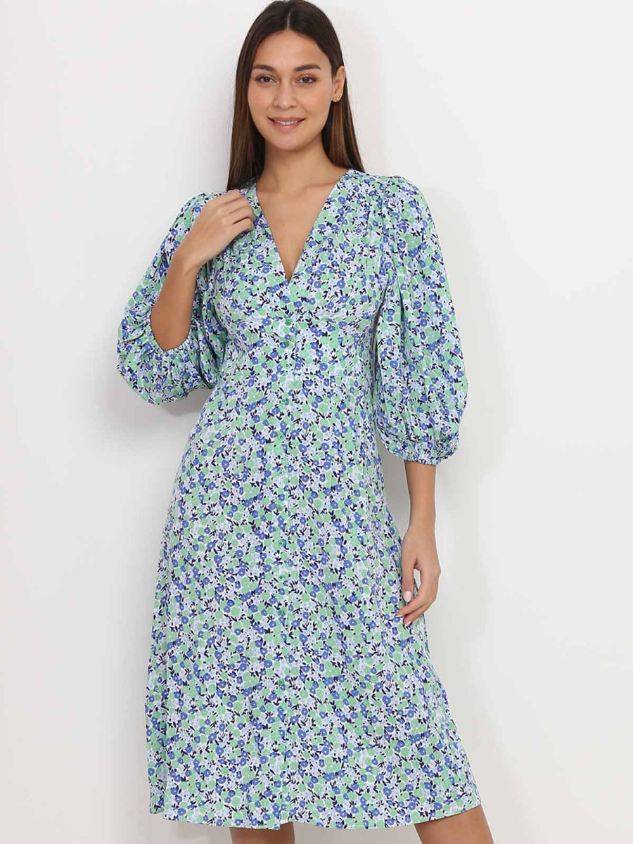 Robe mi-longue verte fleurie à manches bouffantes