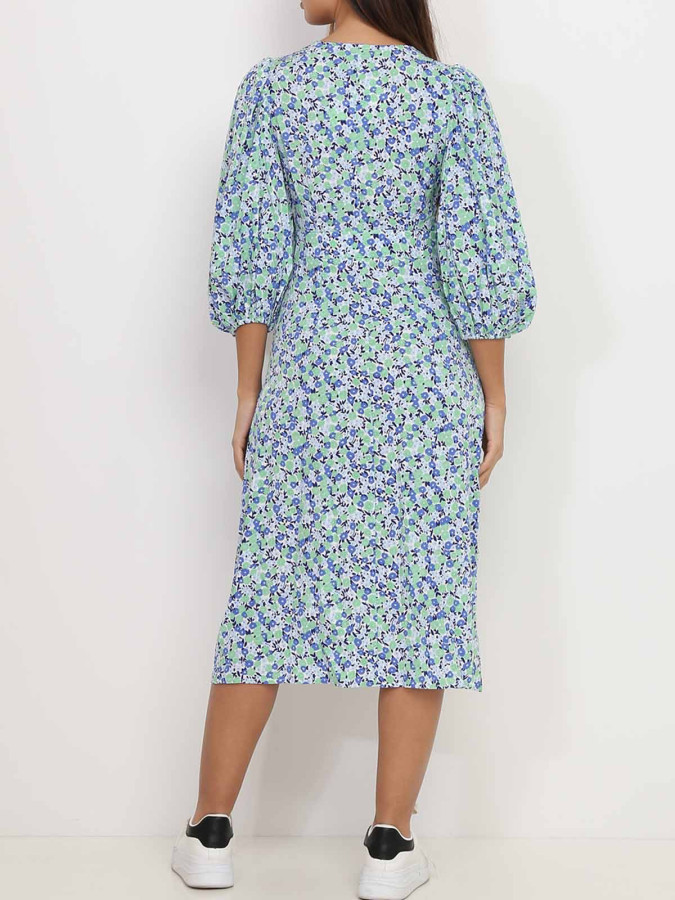 Robe mi-longue verte fleurie à manches bouffantes
