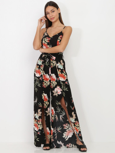 Combinaison fluide noire fendue à motif floral