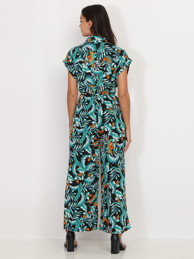 Combinaison fluide noire à imprimé feuilles vertes