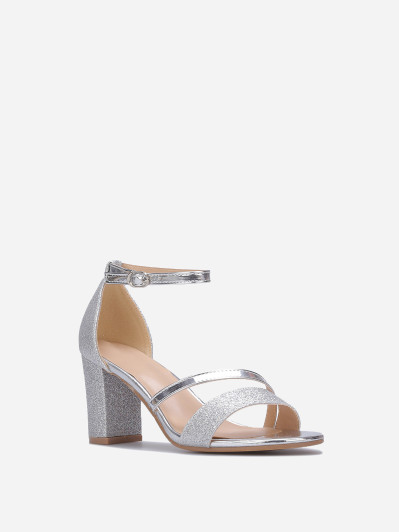 Sandales à talons argentées scintillantes avec brides vernies
