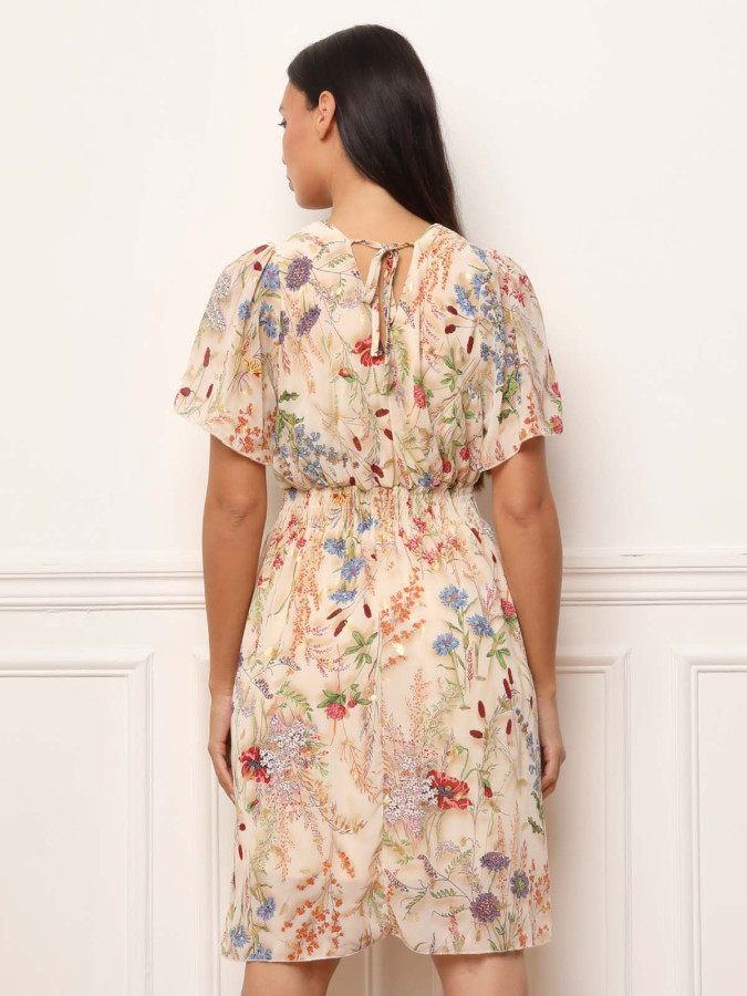 Robe beige à fleurs colorées et détails dorés