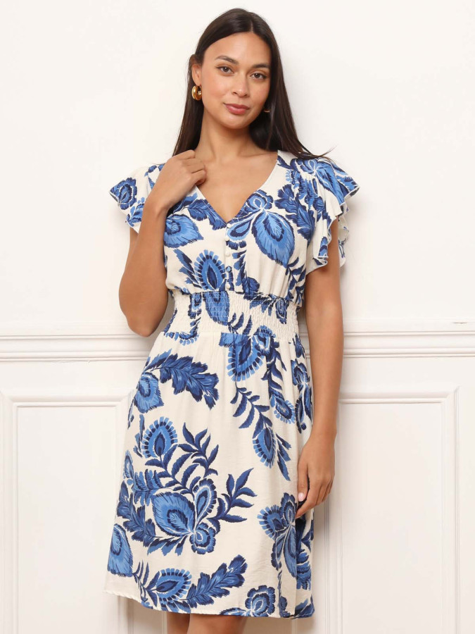 Robe bleue à motifs et manches volantées