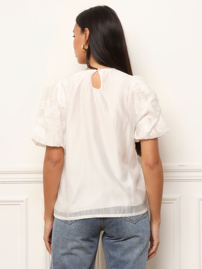 Top à manches bouffantes et motifs floraux