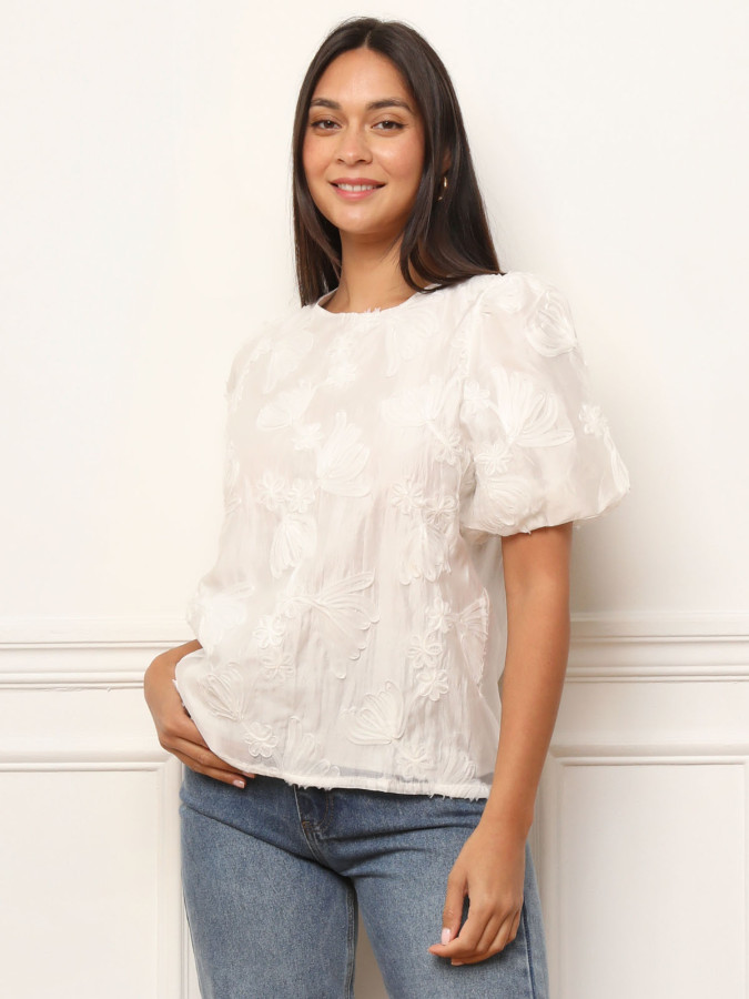 Top à manches bouffantes et motifs floraux