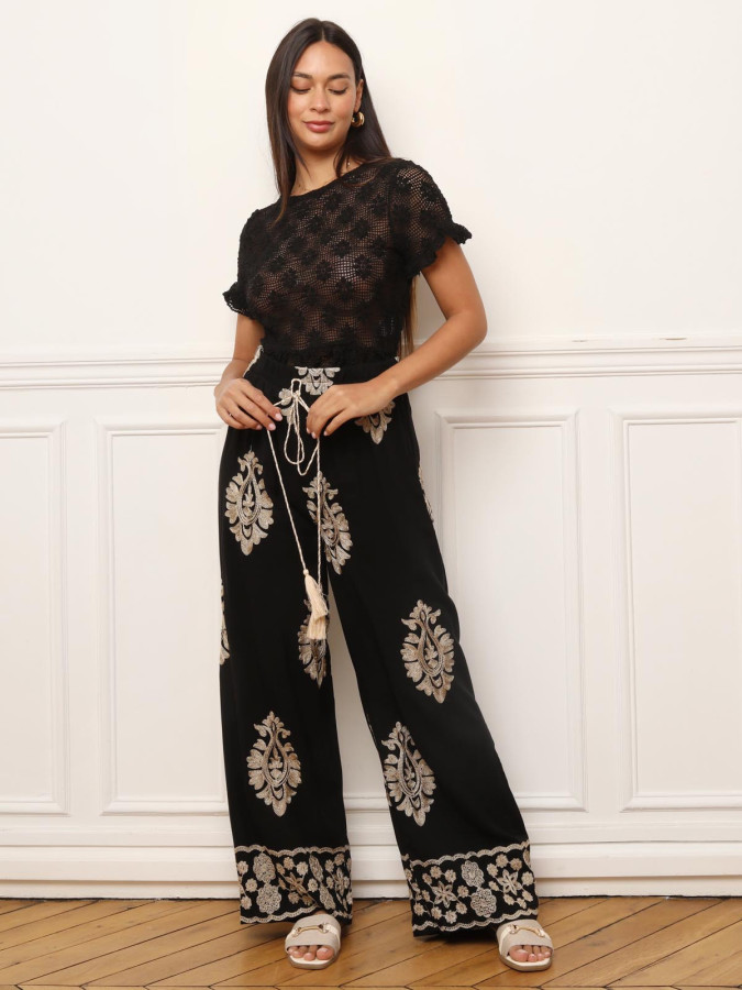 Pantalon noir à motifs baroques brodés