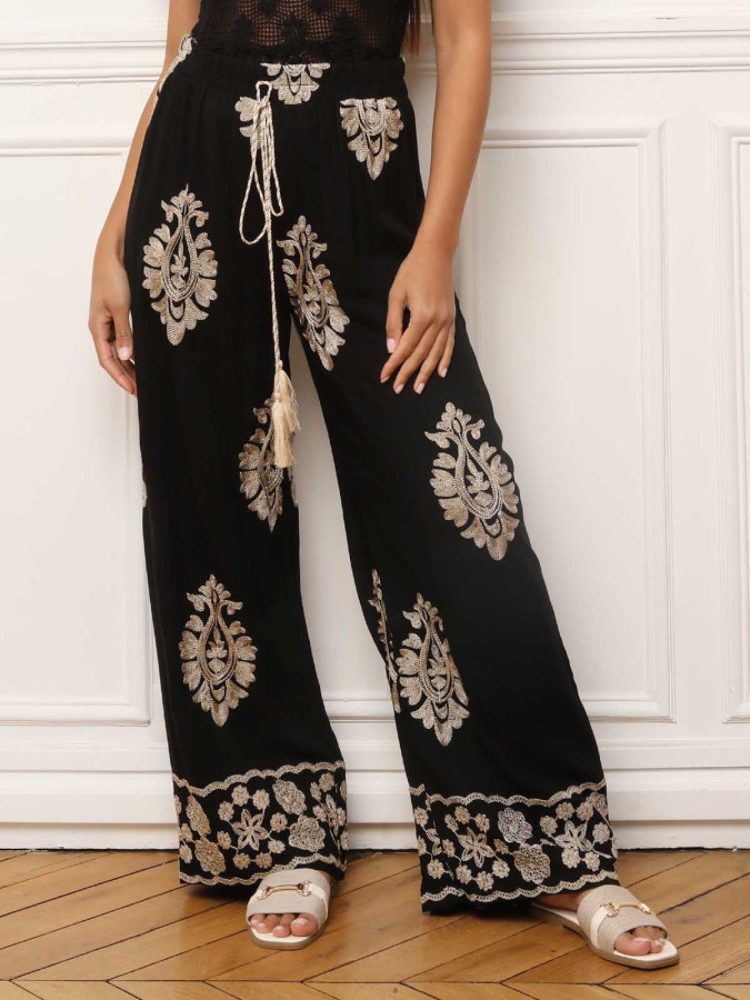 Pantalon noir à motifs baroques brodés