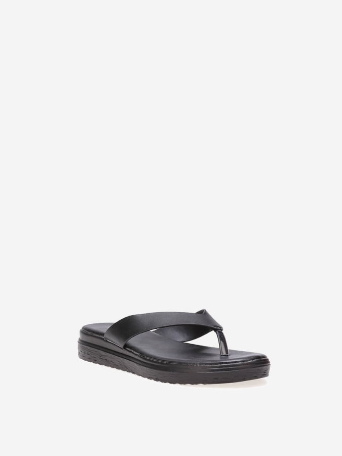 Tongs noires avec plateforme compensée