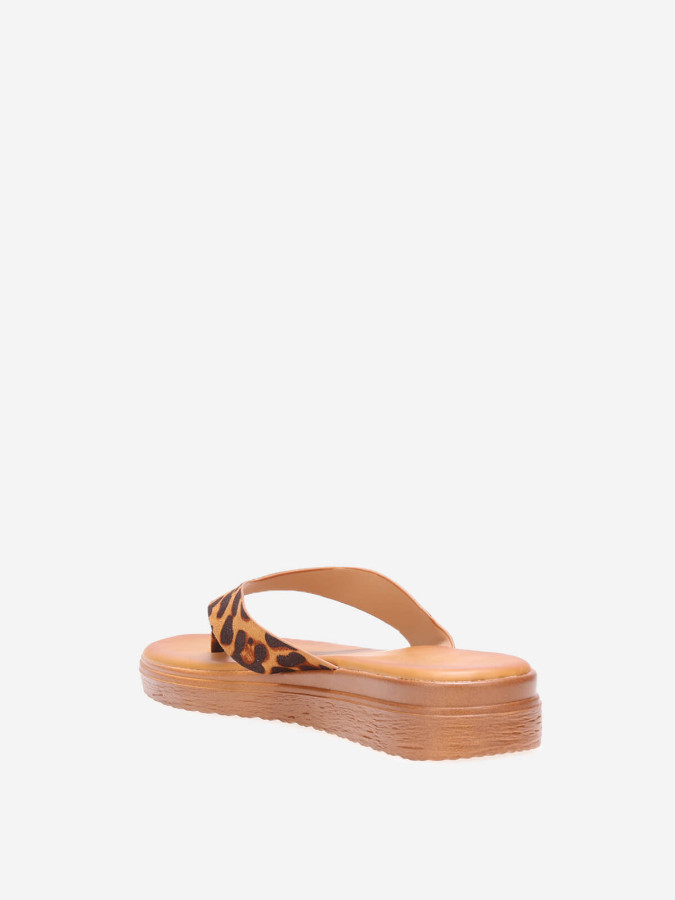 Tongs léopard avec plateforme compensée