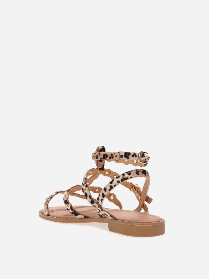 Sandales léopard cloutées avec brides à œillets