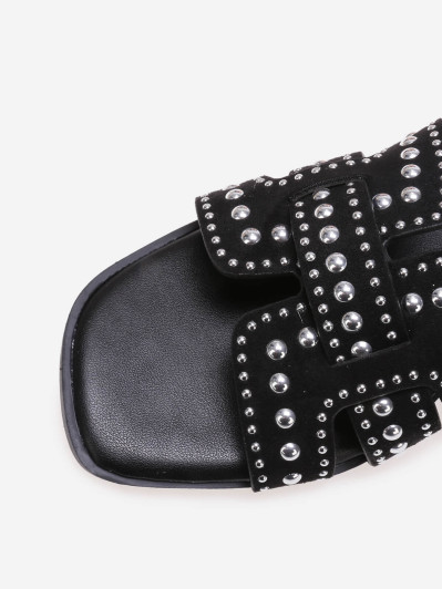 Mules noires avec bride en suédine cloutée