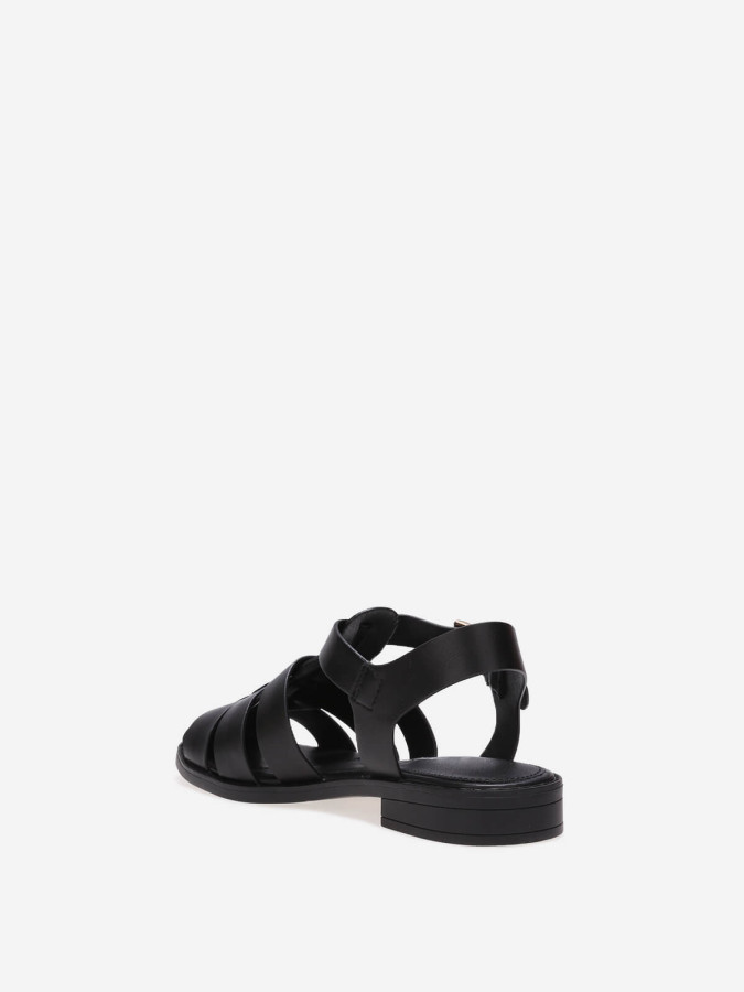 Sandales noires style méduse à bout fermé et boucle dorée