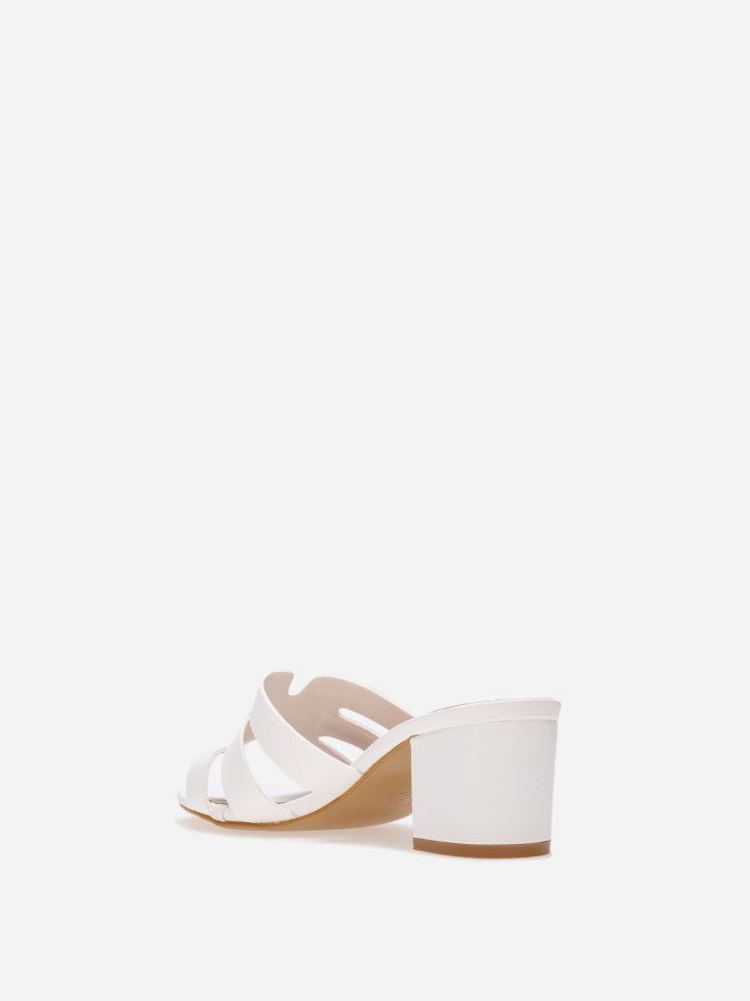 Mules à bride ajourée et talon