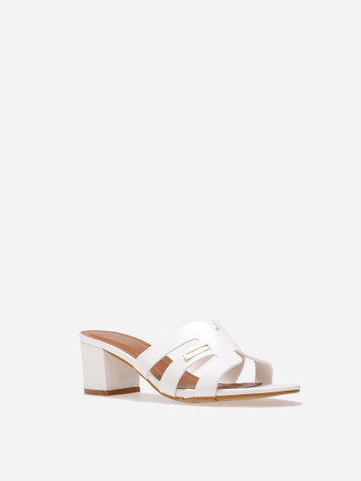 Mules à bride ajourée et talon