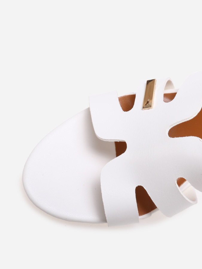 Mules à bride ajourée et talon