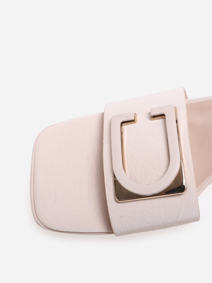 Mules beiges à talon et détail en D métallisé