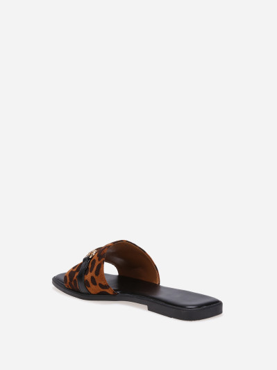 Mules léopard à bride en tissu et mors doré