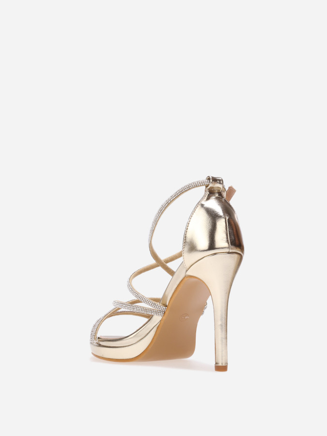Sandales à talon dorées et brides entrecroisées à strass