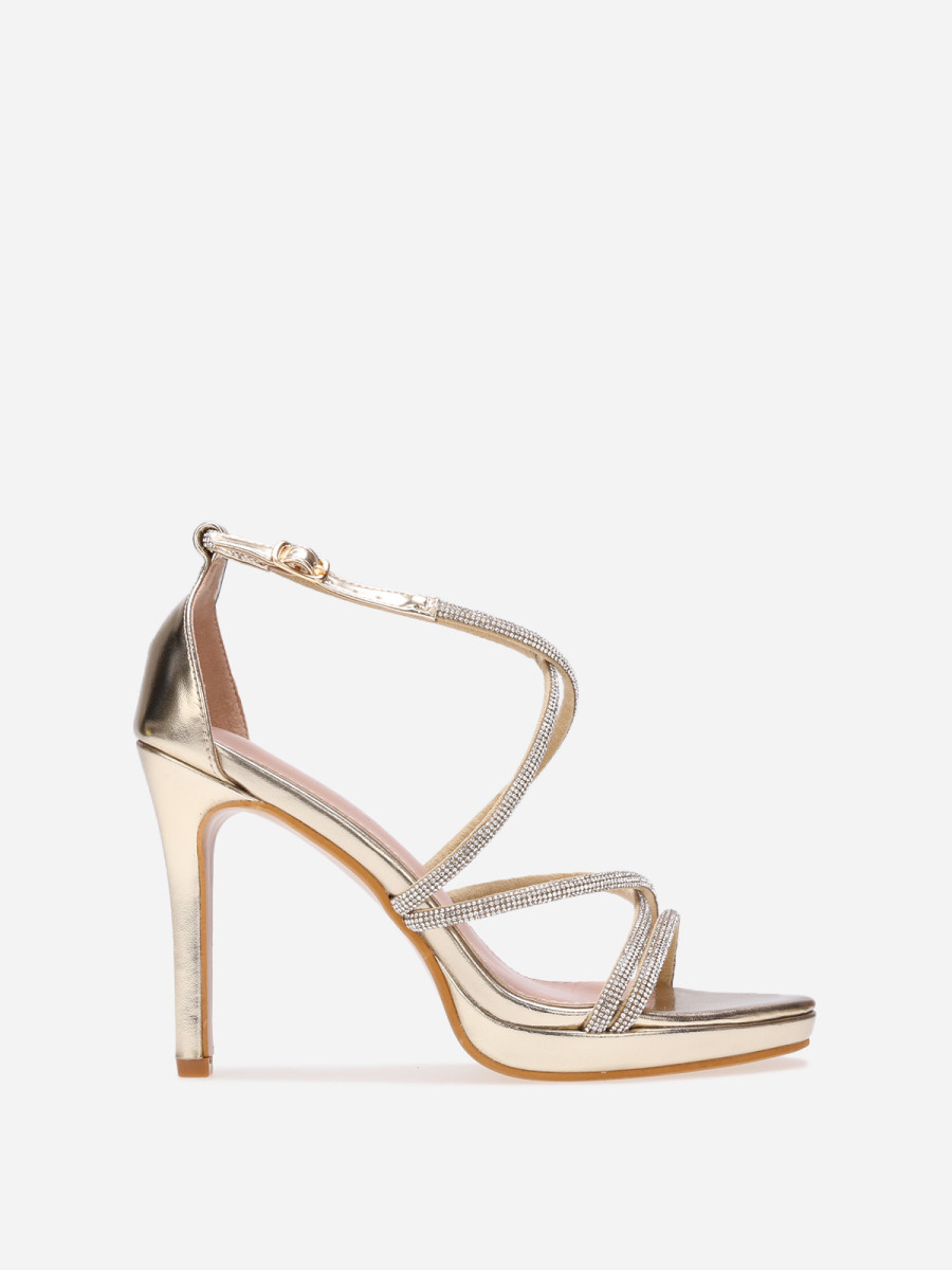 Sandales à talon dorées et brides entrecroisées à strass