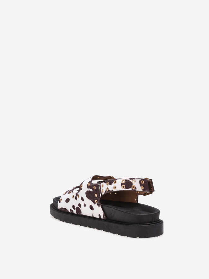 Sandales motif vache à boucles et œillets métalliques